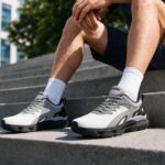 Man walking up outdoor steps in FitVille Rebound Nova Edge walking shoes