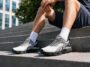 Man walking up outdoor steps in FitVille Rebound Nova Edge walking shoes