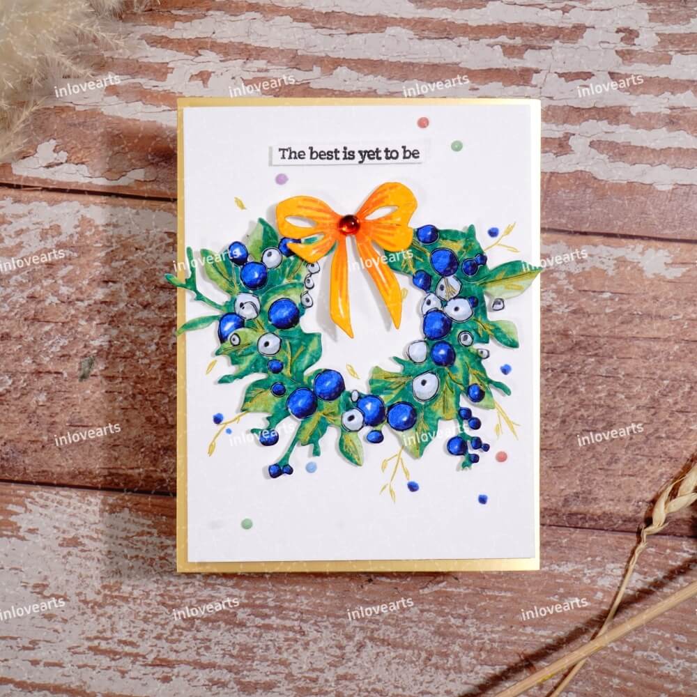Christmas wreath card with a bow made with Inlovearts cutting dies