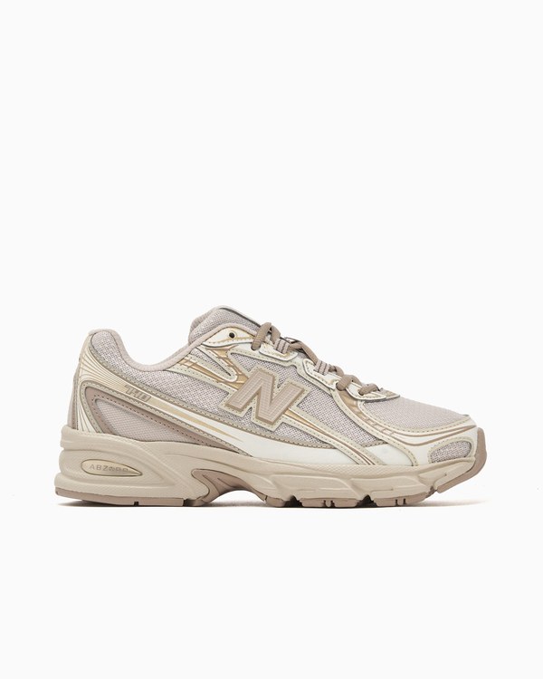 New Balance U740 9HK en beige y marrón vista de lado